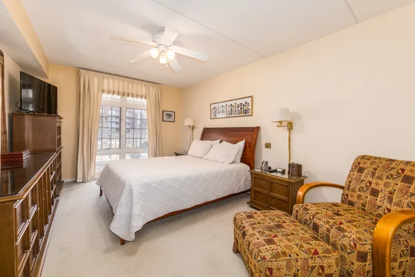 a bed room with bed and a couch