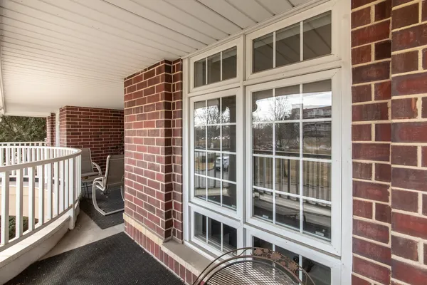 a view of a balcony with a window