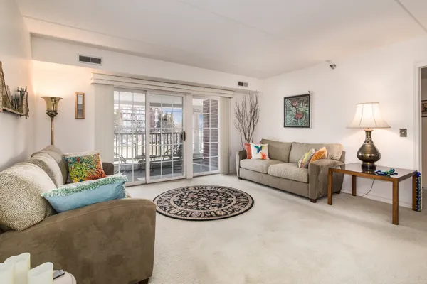 a living room with furniture and a couch