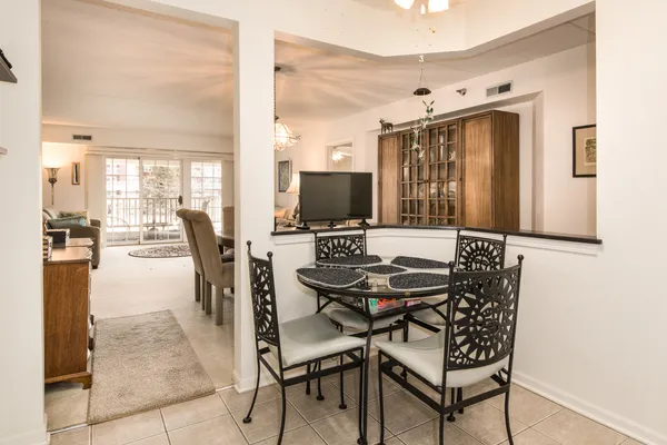 a view of a workspace with furniture