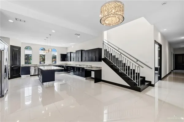 a view of a hallway with seating area