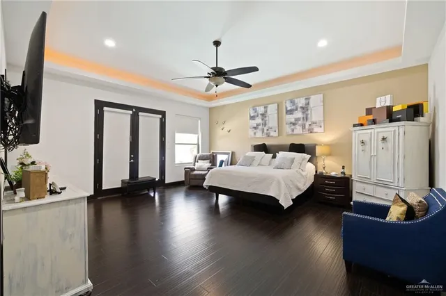 a bedroom with bed and window