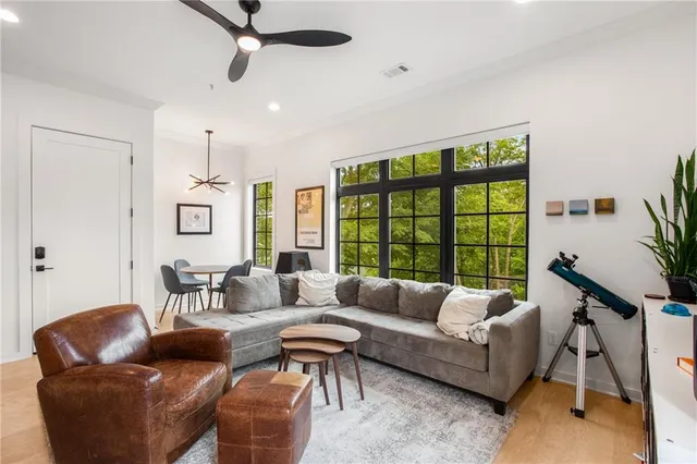 a kitchen with stainless steel appliances a sink stove and cabinets