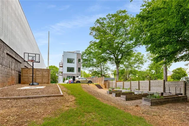 a view of a balcony with wooden floor and city view