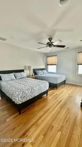 a living room with couch and window