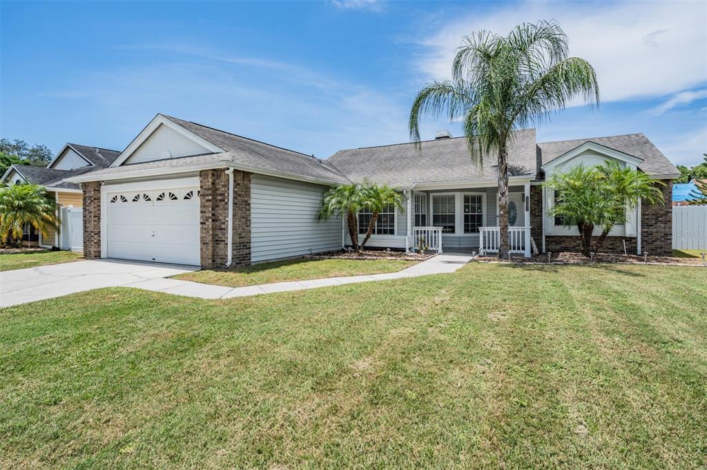 a house view with a garden space