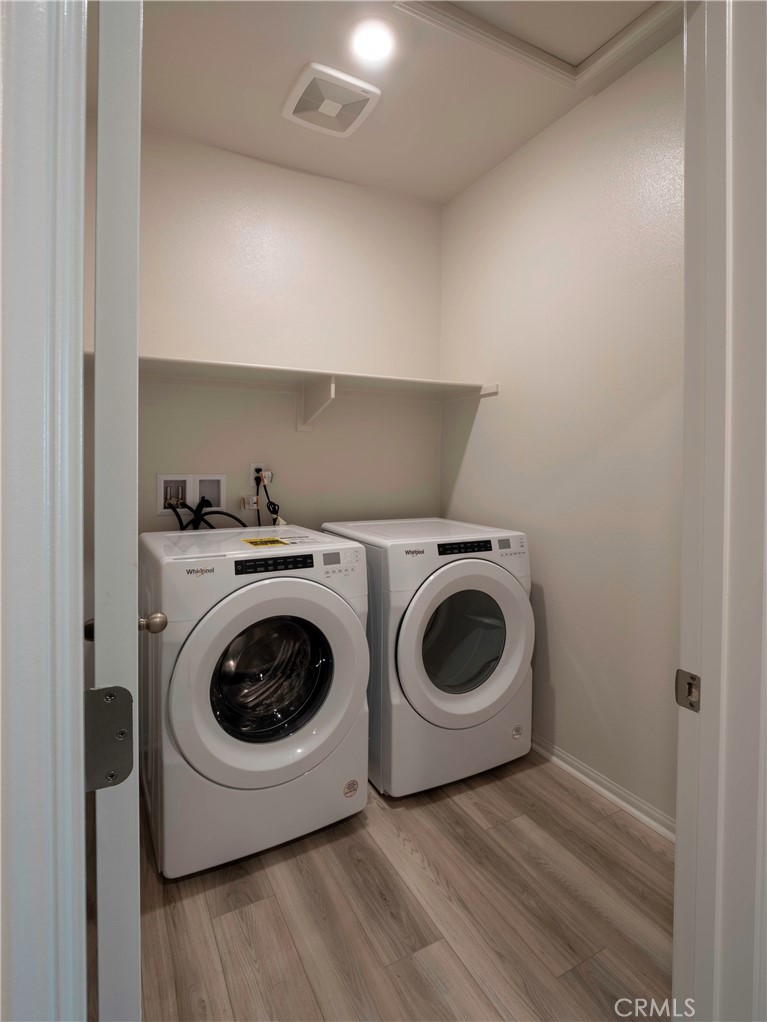 40336 Birchfield Drive Temecula, CA 92591 - Photo 19 of 39 a utility room with dryer and washer
