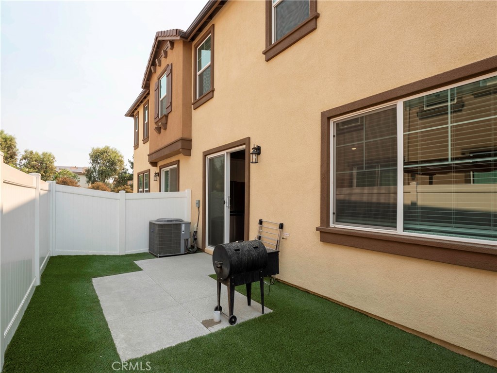 40336 Birchfield Drive Temecula, CA 92591 - Photo 30 of 39 a backyard of a house with table and chairs