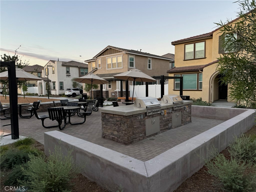 40336 Birchfield Drive Temecula, CA 92591 - Photo 34 of 39 a view of a house with pool and chairs