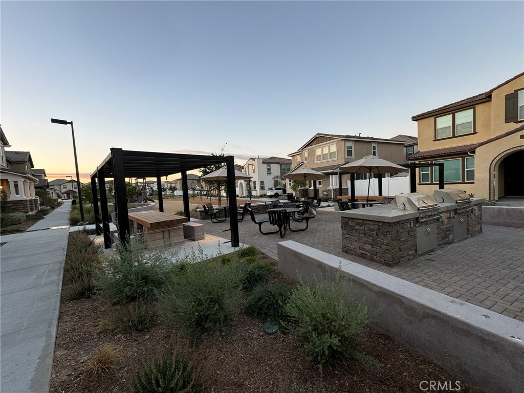 40336 Birchfield Drive Temecula, CA 92591 - Photo 35 of 39 a view of a house with pool and sitting area