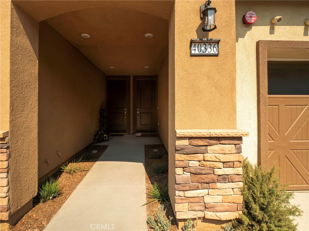 40336 Birchfield Drive Temecula, CA 92591 - Photo 4 of 39 a picture of a bathroom with a shower and a sink