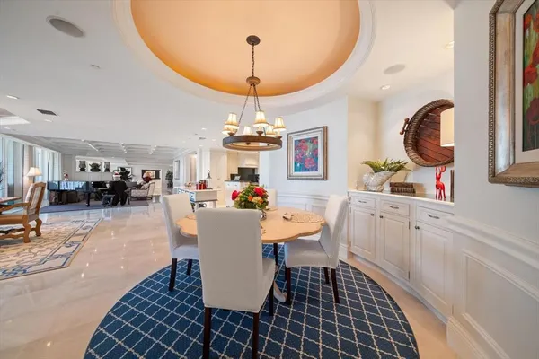 a kitchen with granite countertop a sink and a stove