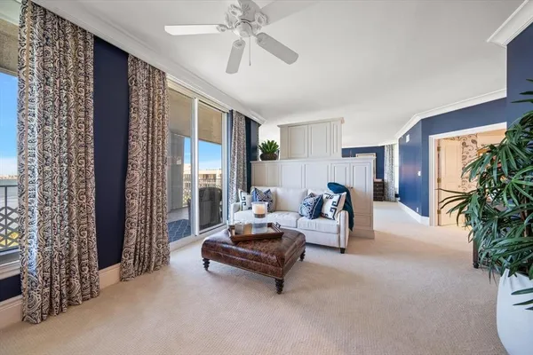 a living room with furniture and a table