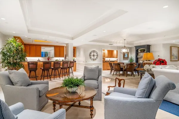a living room with furniture and a table