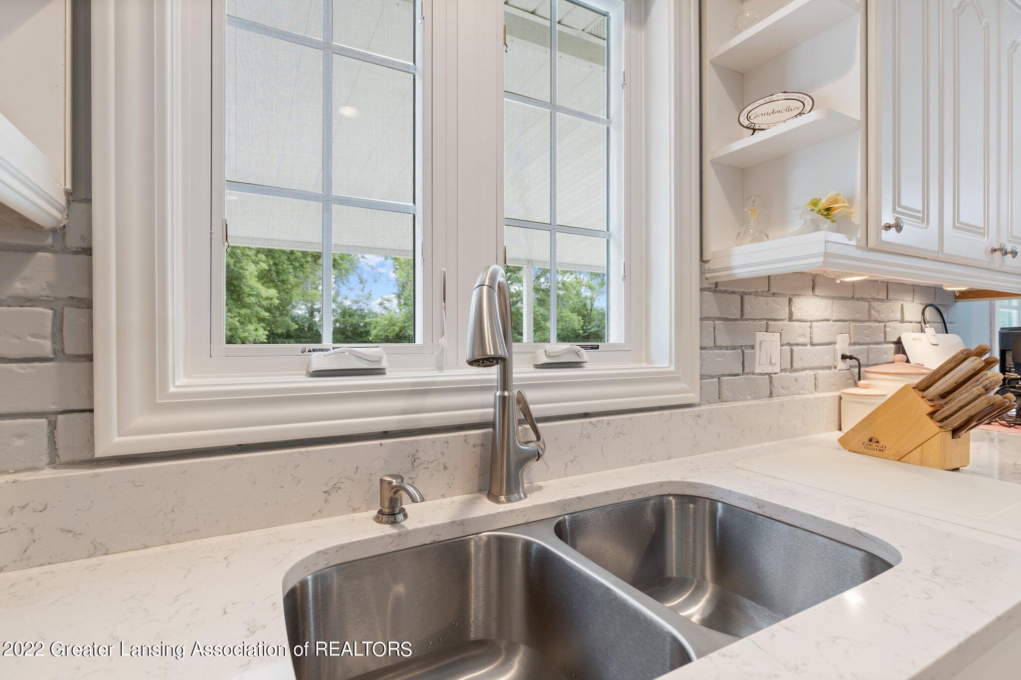 99 South Aurelius Road Mason, MI 48854 - Photo 11 of 32 99, kitchen sink