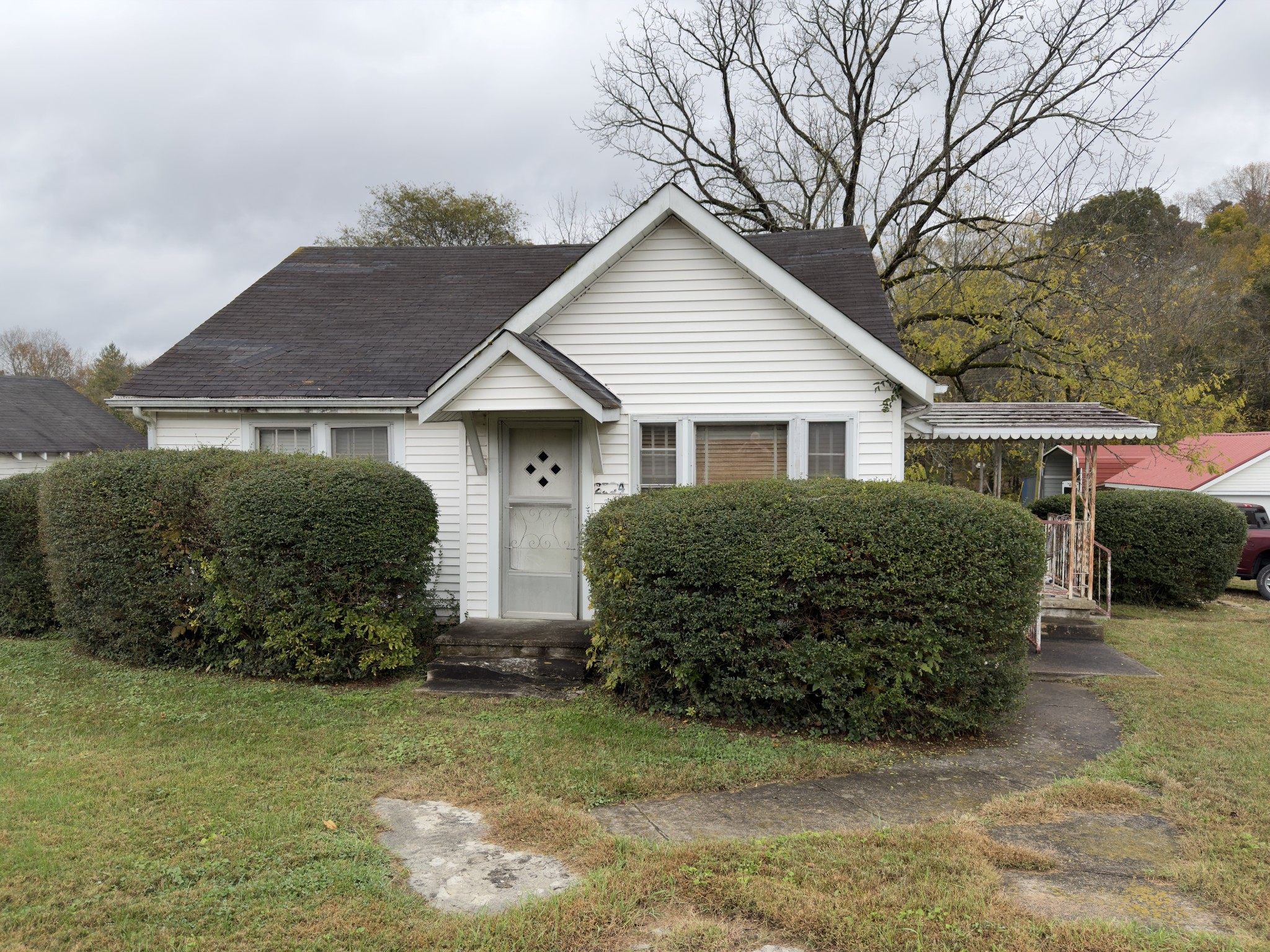 2594 Faulkner Springs Road McMinnville, TN 37110 - Photo 1 of 17 a front view of house with garden