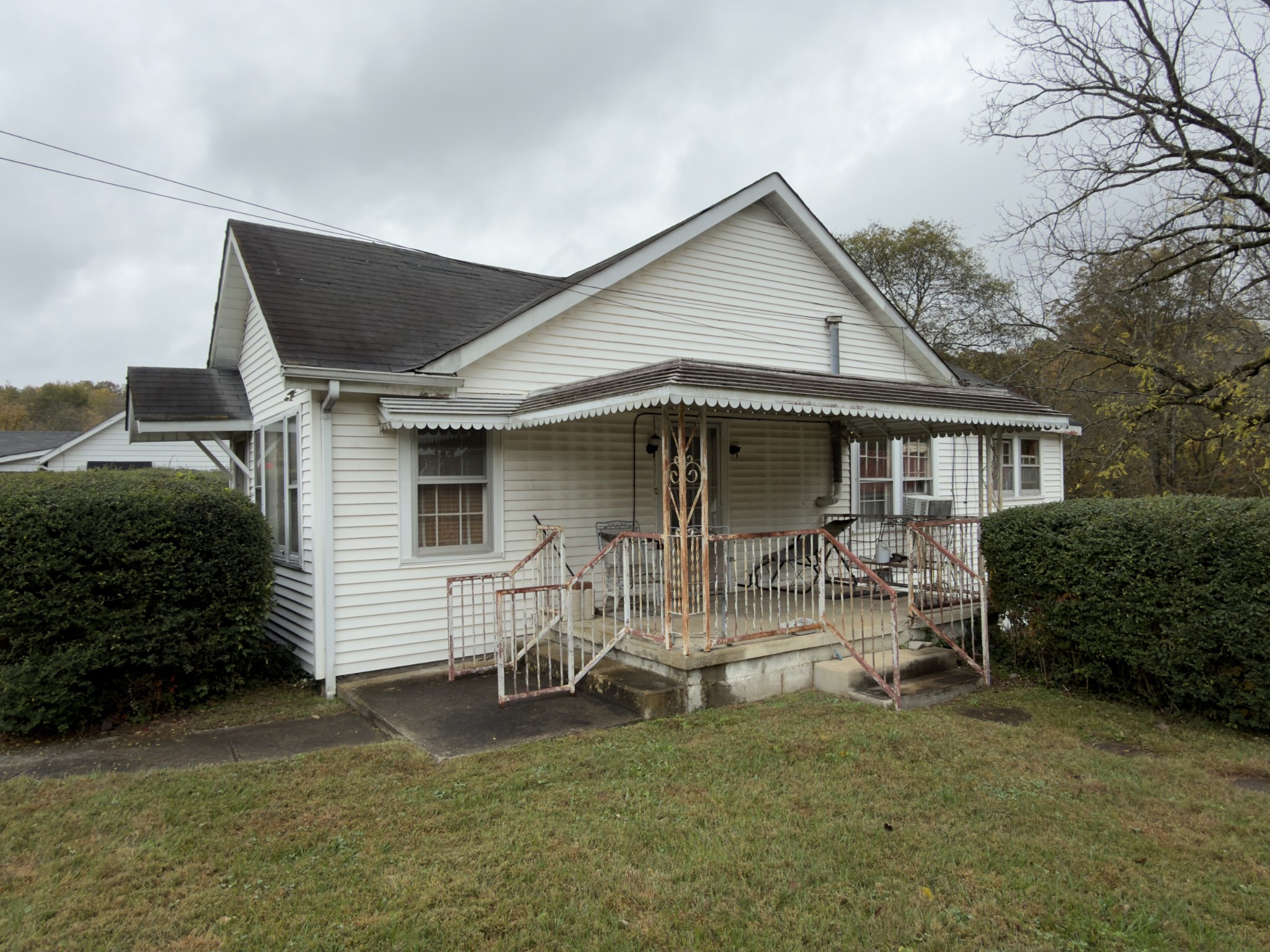 2594 Faulkner Springs Road McMinnville, TN 37110 - Photo 2 of 17 a front view of a house with patio