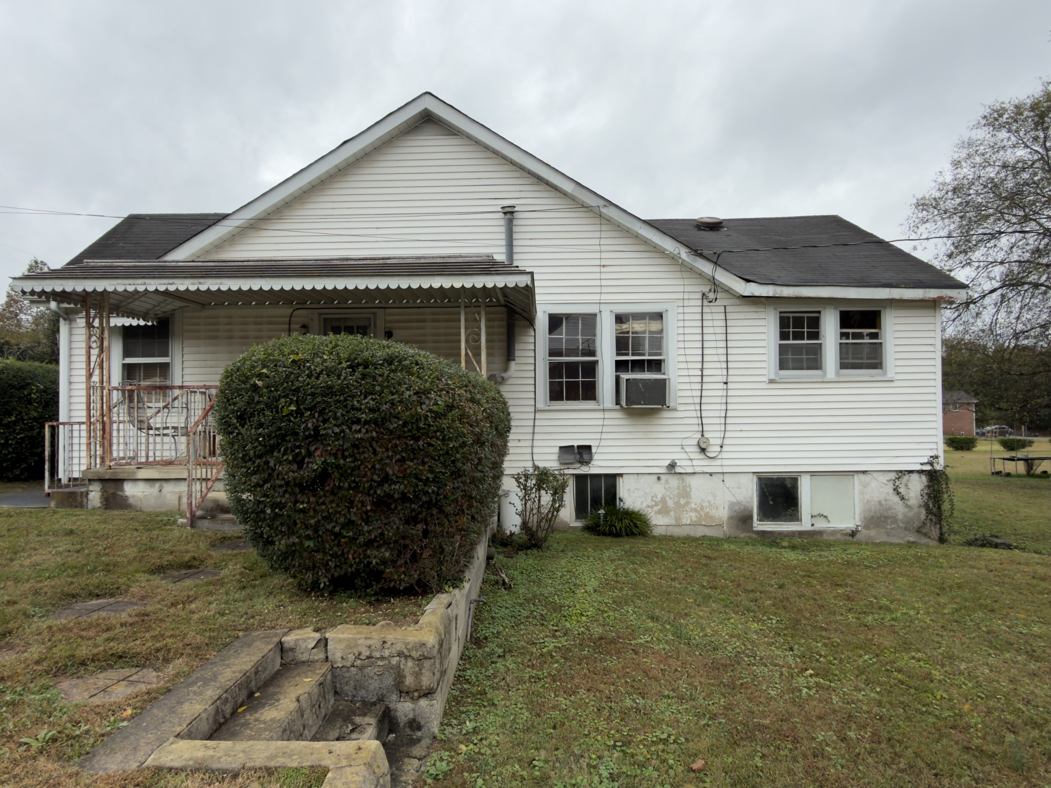 2594 Faulkner Springs Road McMinnville, TN 37110 - Photo 3 of 17 a front view of house with yard and seating space