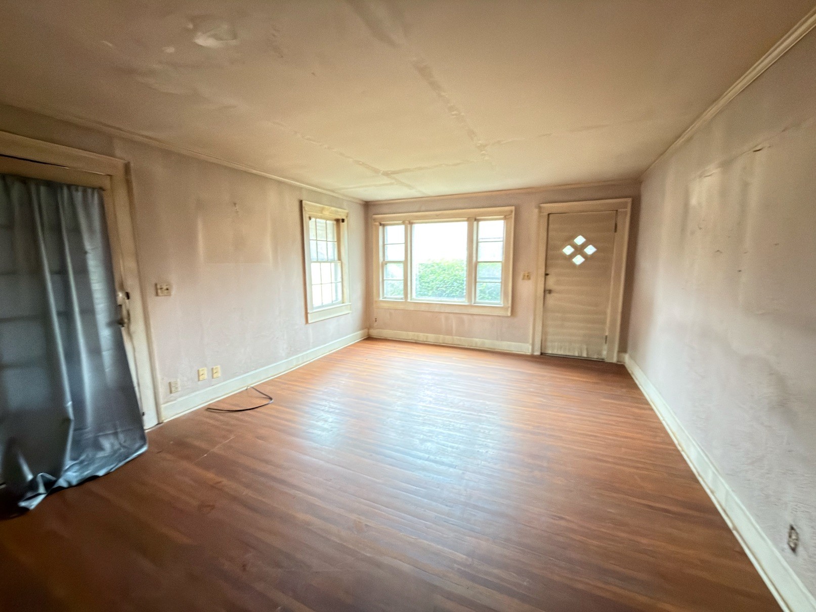 2594 Faulkner Springs Road McMinnville, TN 37110 - Photo 10 of 17 a view of an empty room with wooden floor and a window
