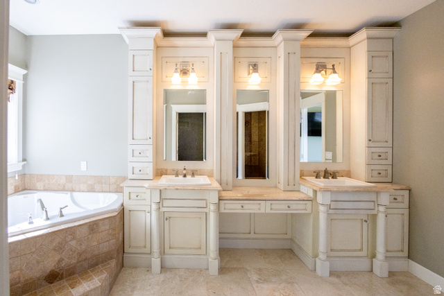 434 Cardon Ridge Drive Smithfield, UT 84335 - Photo 4 of 59 Bathroom with double vanity and a garden tub