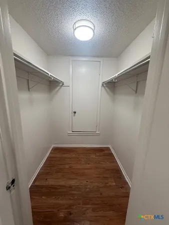 a view of a room with an empty space