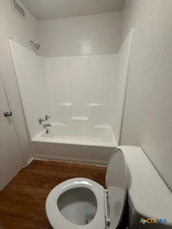 a bathroom with a sink and bathtub