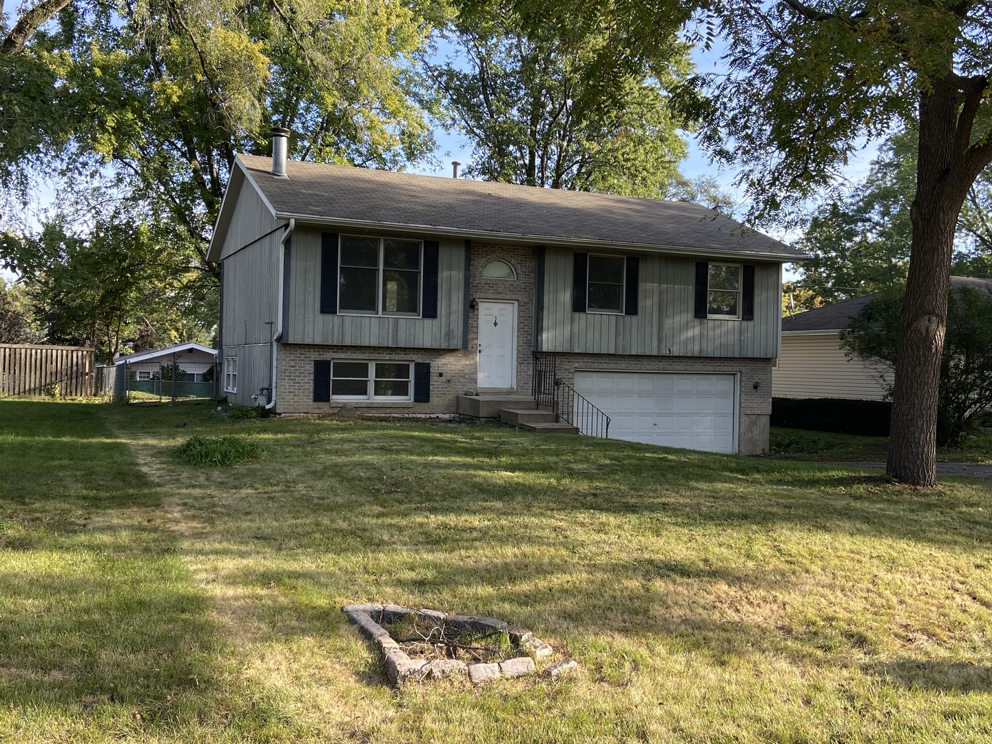 a view of a house with a yard balcony
