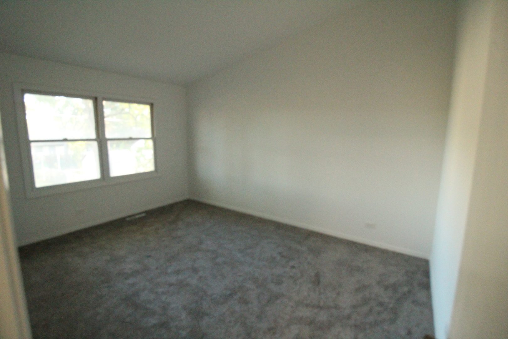3 Deerpath Road Lake In The Hills, IL 60156 - Photo 12 of 22 an empty room with a window