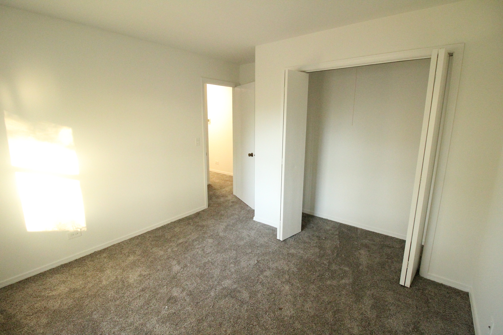 3 Deerpath Road Lake In The Hills, IL 60156 - Photo 14 of 22 an empty room with a natural light