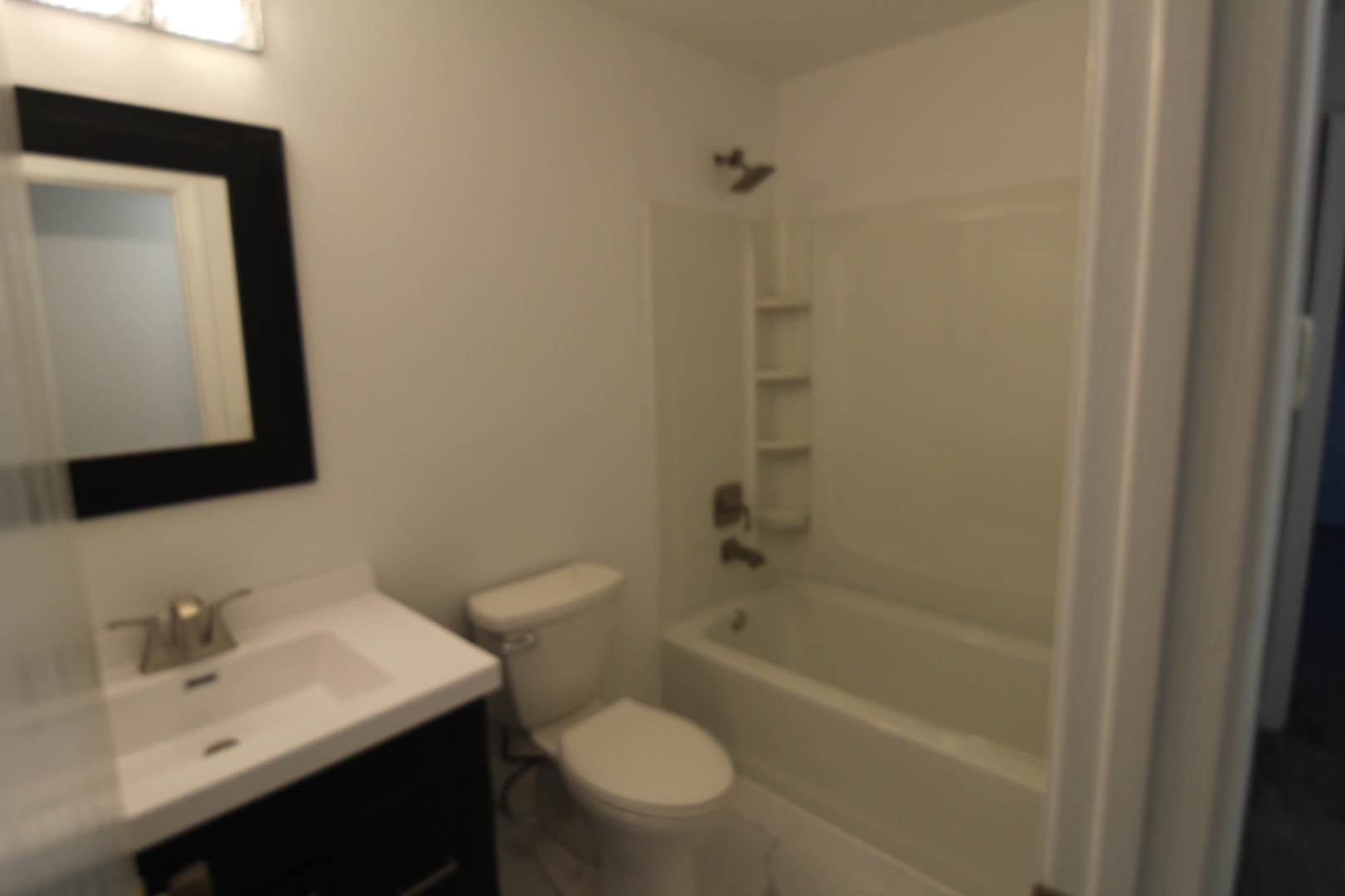 3 Deerpath Road Lake In The Hills, IL 60156 - Photo 8 of 22 a bathroom with a sink toilet and shower