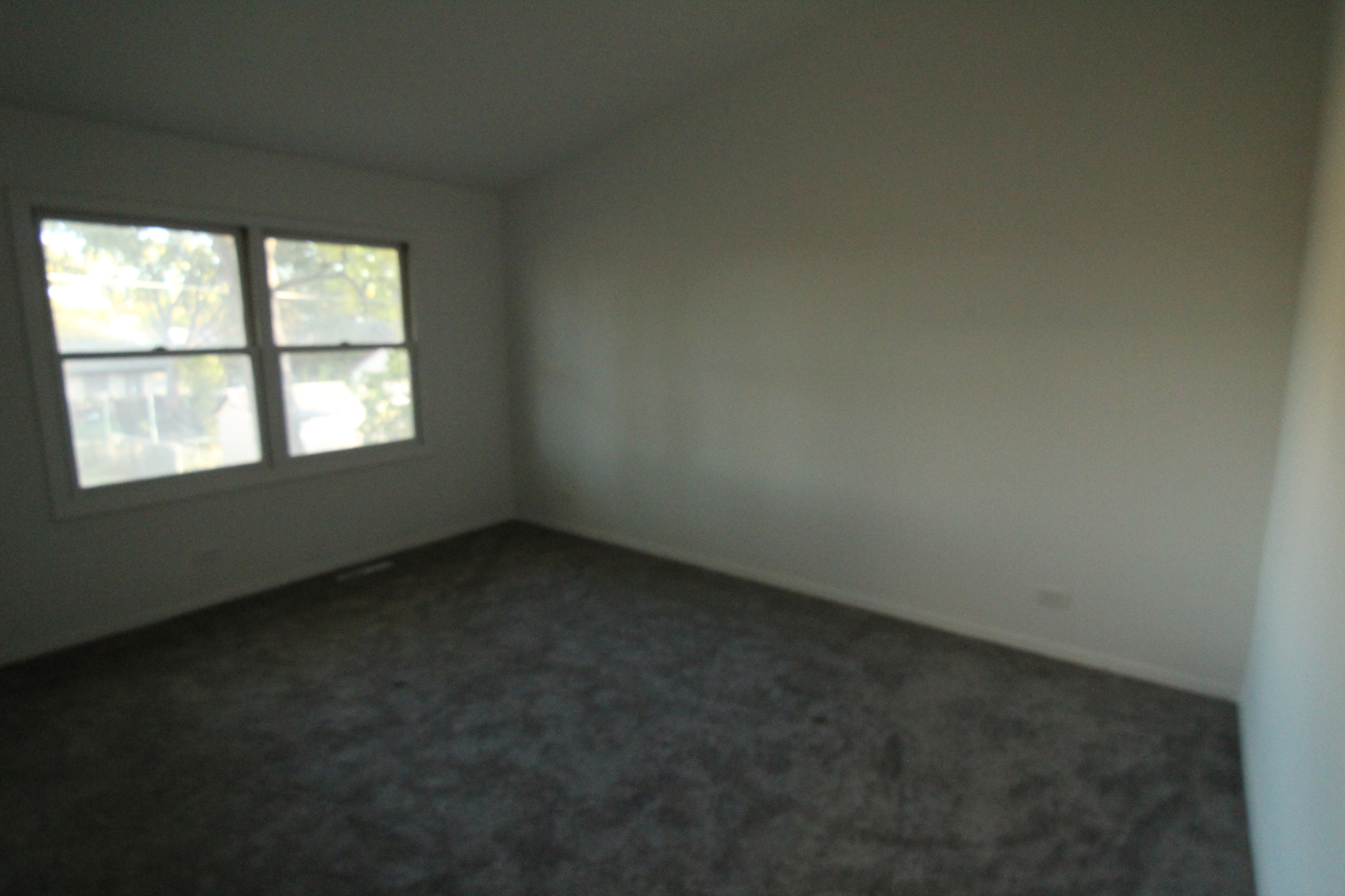 3 Deerpath Road Lake In The Hills, IL 60156 - Photo 9 of 22 an empty room with a window