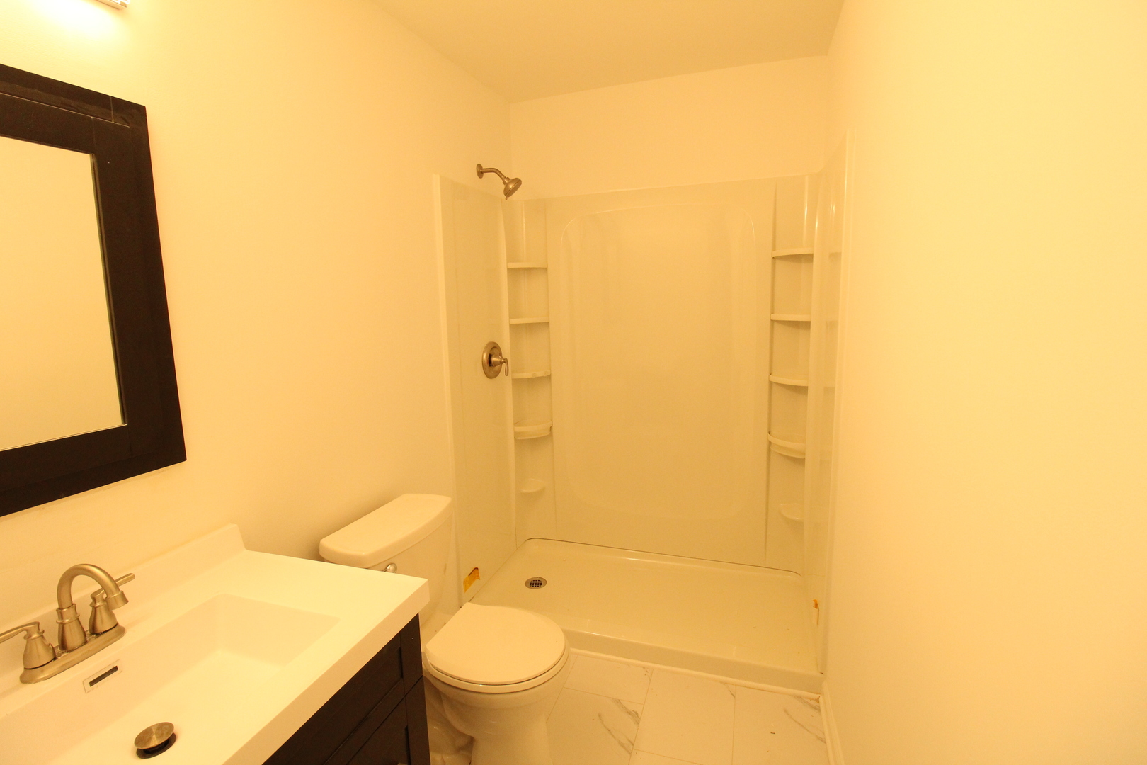 3 Deerpath Road Lake In The Hills, IL 60156 - Photo 10 of 22 a bathroom with a sink mirror toilet and shower