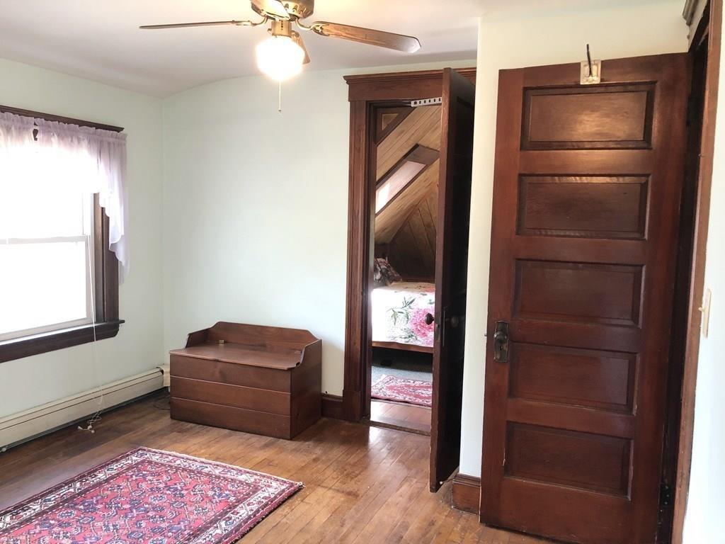 16 Bluff Road Weymouth, MA 02191 - Photo 11 of 20 a room with furniture and a closet