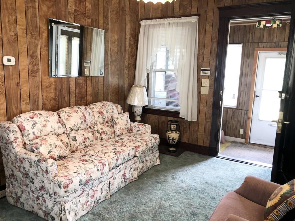 16 Bluff Road Weymouth, MA 02191 - Photo 2 of 20 a bedroom with a bed and window