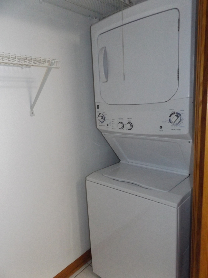 6953 Olympic Drive Bridgeview, IL 60455 - Photo 30 of 33 a utility room with dryer and washer