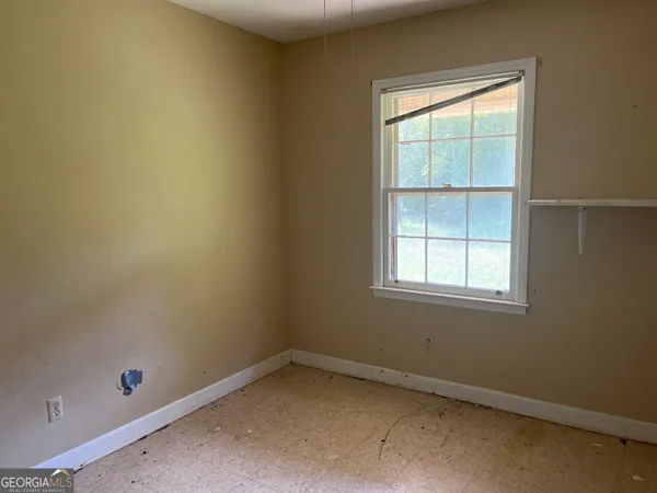 an empty room with a window