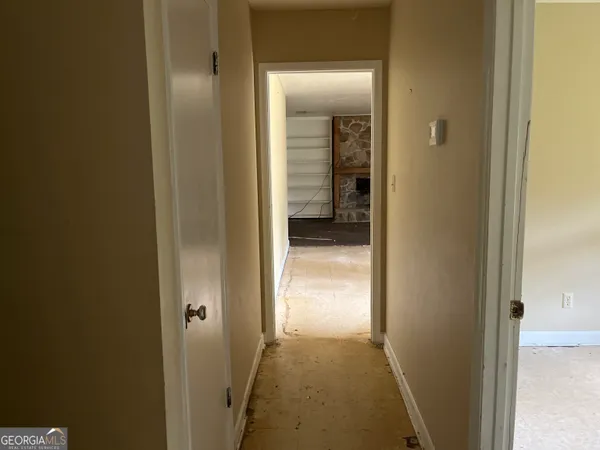 a view of a bathroom from a hallway