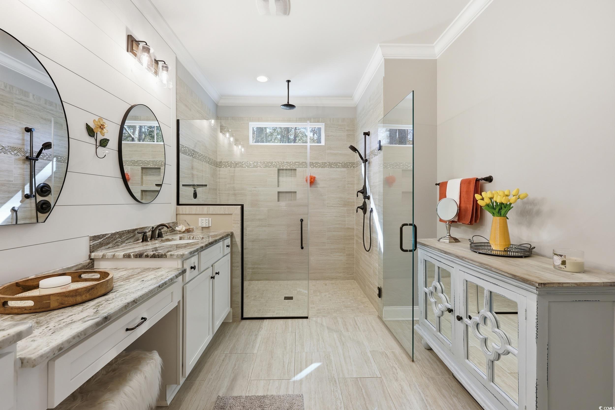 485 Kings River Road Pawleys Island, SC 29585 - Photo 18 of 39 Bathroom with vanity, a shower stall, and ornamental molding