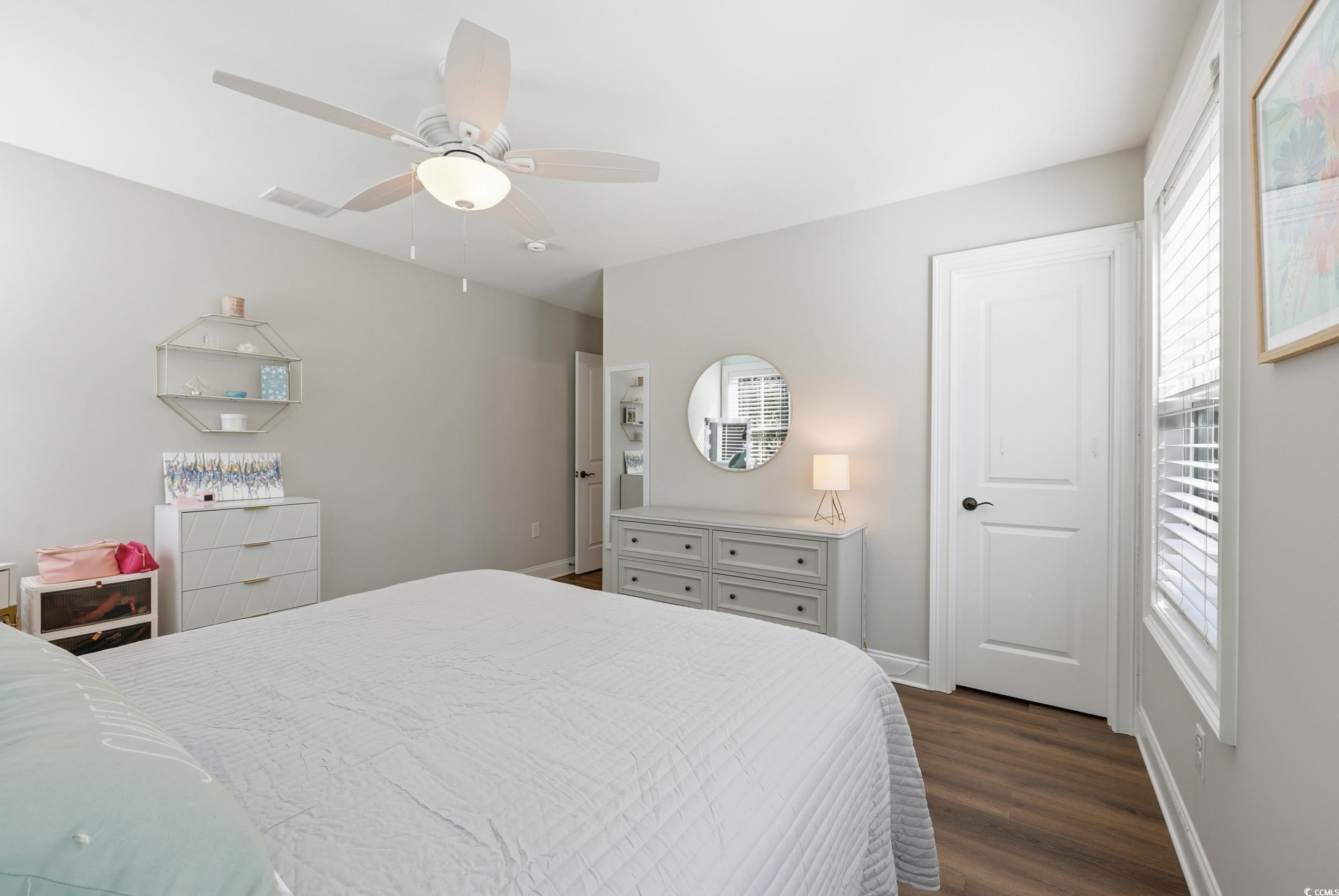 485 Kings River Road Pawleys Island, SC 29585 - Photo 25 of 39 Bedroom featuring dark wood-style floors and ceiling fan