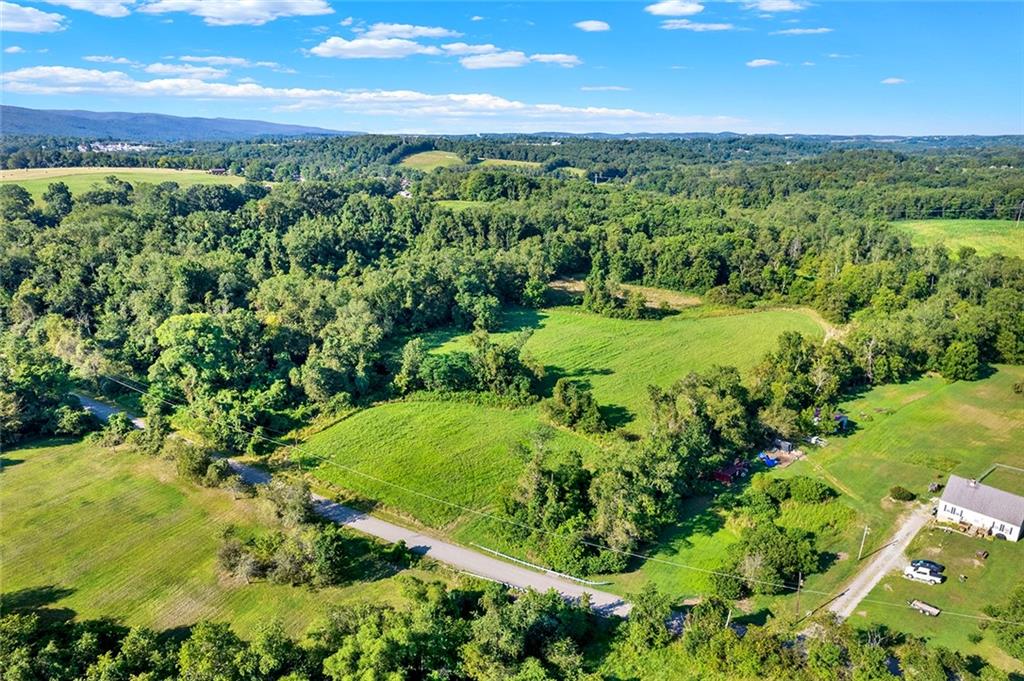 a view of a yard with an outdoor space