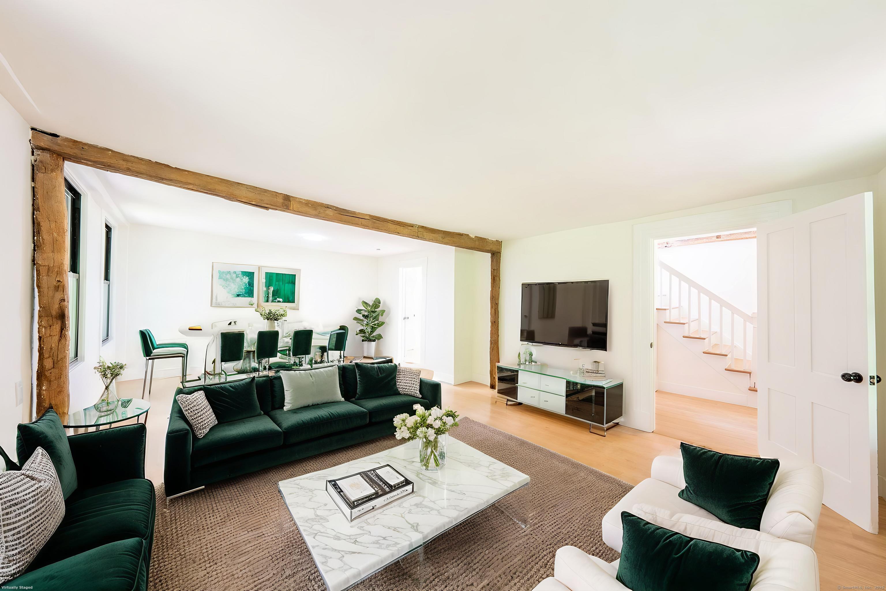 219 Redding Road Redding, CT 06896 - Photo 12 of 27 a living room with furniture and a flat screen tv