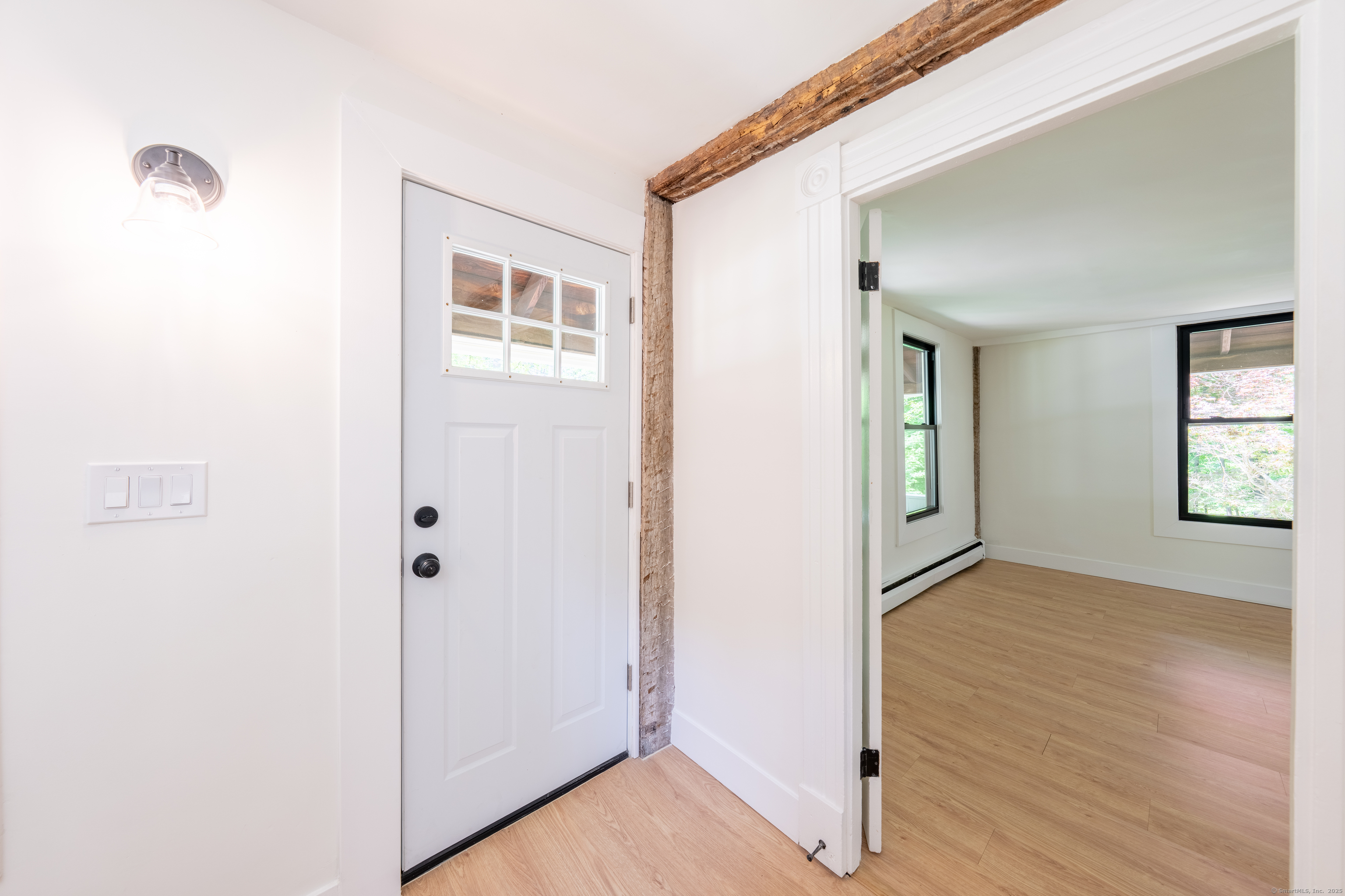 219 Redding Road Redding, CT 06896 - Photo 14 of 27 a view of an empty room with closet and a window