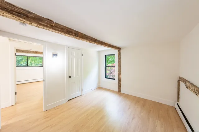 a view of an empty room and window