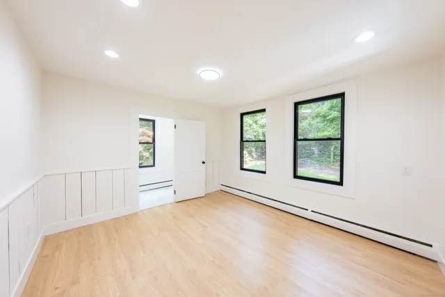 an empty room with windows