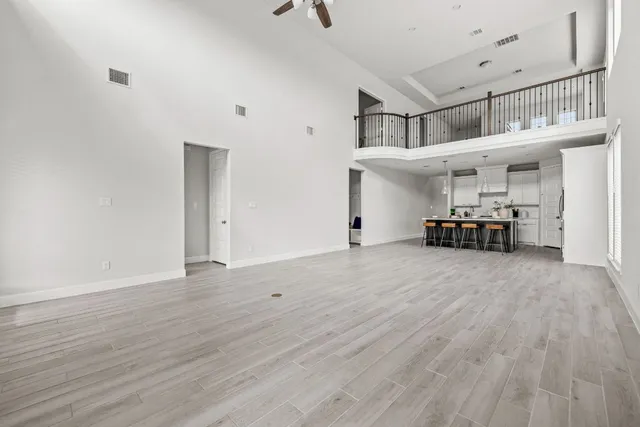 a view of livingroom with furniture and workspace