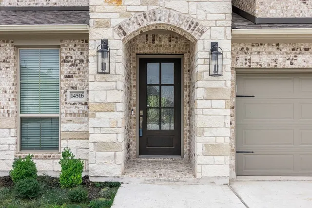 a front view of a house with parking