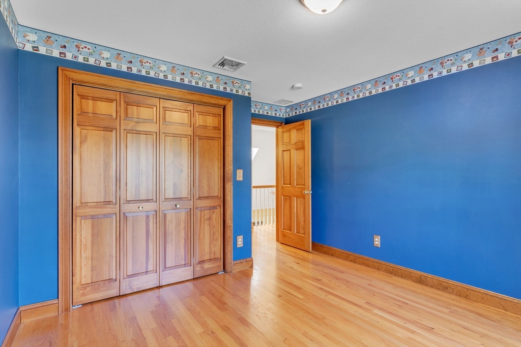 155 Orchard Road East Longmeadow, MA 01028 - Photo 25 of 42 a view of an empty room with wooden floor and a window