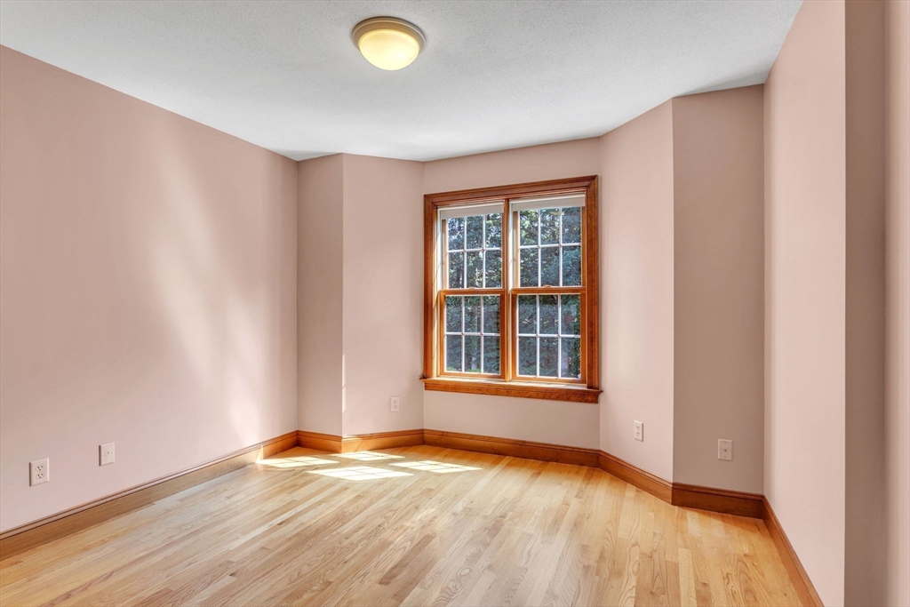 155 Orchard Road East Longmeadow, MA 01028 - Photo 27 of 42 an empty room with wooden floor and windows