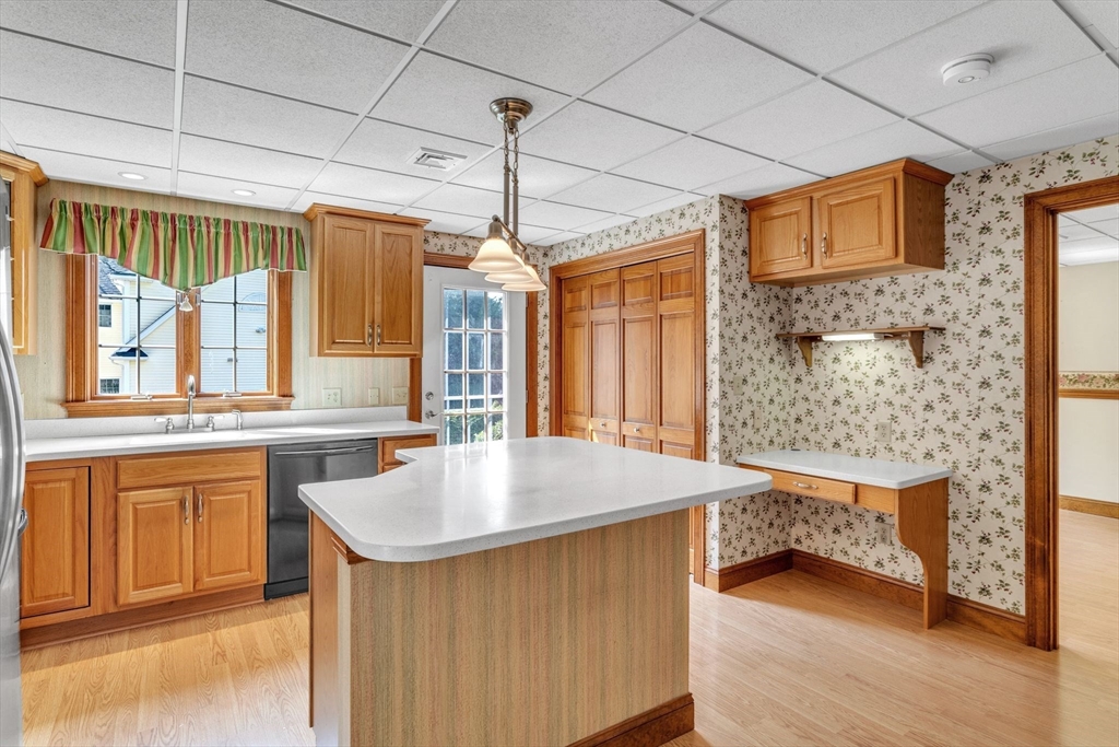 155 Orchard Road East Longmeadow, MA 01028 - Photo 31 of 42 a dining hall with stainless steel appliances granite countertop a sink and a refrigerator