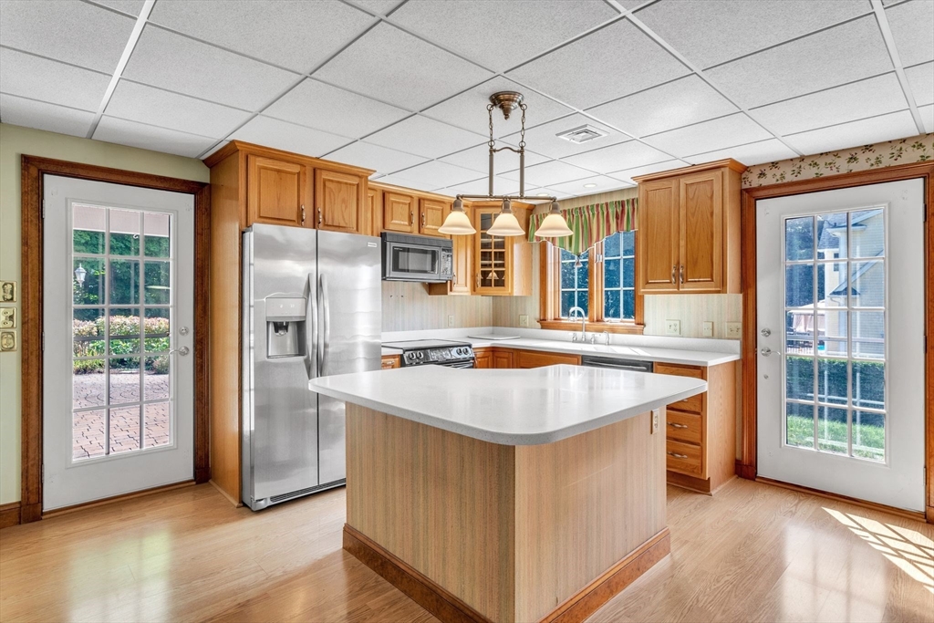 155 Orchard Road East Longmeadow, MA 01028 - Photo 32 of 42 a kitchen with stainless steel appliances granite countertop a stove and a refrigerator